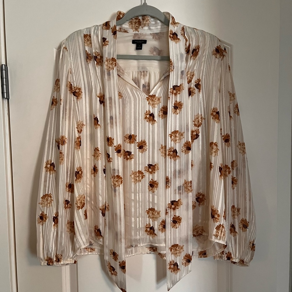 Floral blouse with optional bow and gold accents